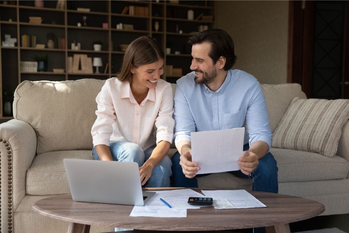 Homeowner signing paperwork, Refinance